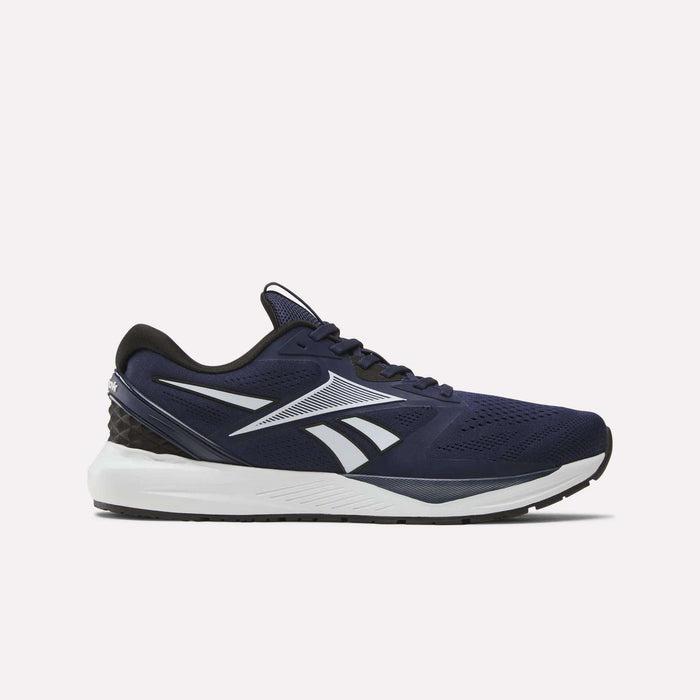 The Reebok Men's Nanoflex Trainer 2 Shoes feature a dark blue design with white and black accents, a white sole, and a black heel—ideal workout shoes for your next training session.