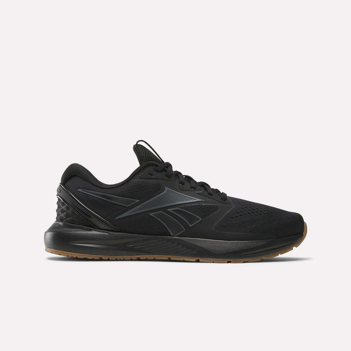 The Reebok Men's Nanoflex Trainer 2 Shoes in black feature a black sole, subtle gray lines, and the Reebok logo on the side—ideal athletic sneakers for any workout, shown here against a plain white background.