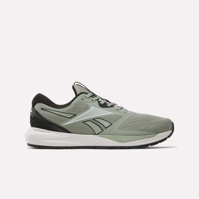 The Reebok Men's Nanoflex 2 Training Shoes in Hazy Green/Black/White feature a breathable mesh upper for optimal airflow, white midsole, black outsole, white side logo, and black heel detail—perfect for athletic workouts.