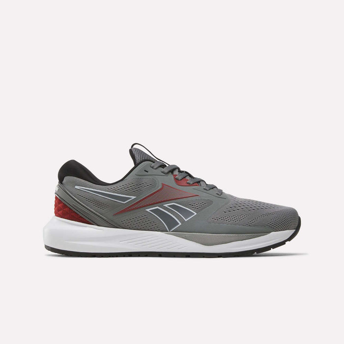 A side-profile view of the Reebok Men's Nanoflex 2 Training Shoes in Grey 4, Black, and Heritage Red, featuring black laces, red accents, a white sole, and breathable mesh construction for optimal comfort—displayed against a plain light background.