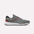 A side-profile view of the Reebok Men's Nanoflex 2 Training Shoes in Grey 4, Black, and Heritage Red, featuring black laces, red accents, a white sole, and breathable mesh construction for optimal comfort—displayed against a plain light background.