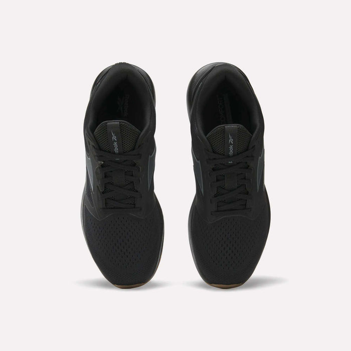 A pair of black Reebok Men's Nanoflex Trainer 2 Shoes viewed from above on a white background, featuring black laces, mesh uppers, and subtle Reebok branding on the tongue and side.