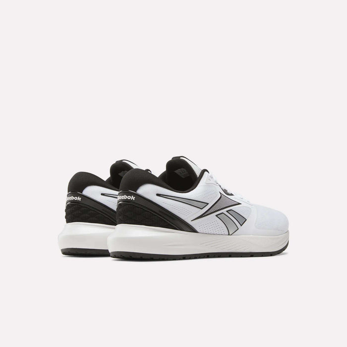 A pair of Reebok Men's Nanoflex 2 Training Shoes in white with black accents, made with breathable mesh and shown from the back and side against a simple light background.