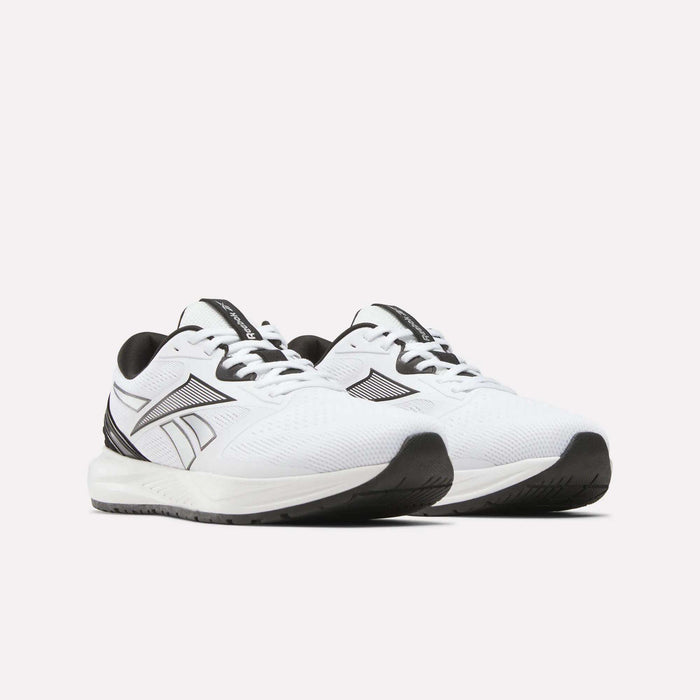 A pair of Reebok Men's Nanoflex 2 Training Shoes in white, highlighted by black accents, breathable mesh uppers, sturdy black soles, and a signature black Reebok logo on the sides—ideal for workouts—displayed against a light background.