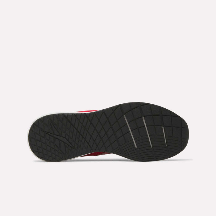 Bottom view of a black rubber sole from the Reebok Men's Nanoflex 2 Training Shoes, showcasing a textured, grid-like tread pattern with several diagonal grooves, set against a plain white background.