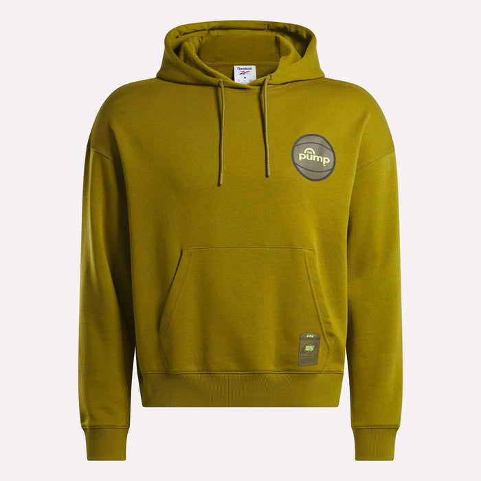 The Reebok Men's Pump OG Hoodie features a mustard yellow color, front pocket, drawstrings, and two round Pump logo patches—one on the left chest and a smaller one near the waistband—a true tribute to retro basketball style.