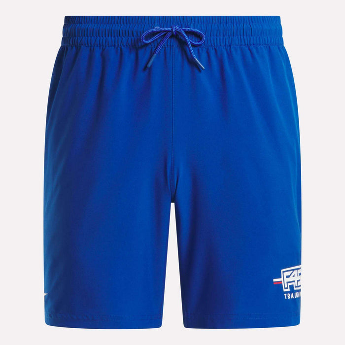 The Men's Reebok x F45 Training Woven Shorts are bright blue with an elastic waistband, drawstring, and a white F45 Training logo on the left leg. Ideal for high-intensity workouts. Brand: Reebok. Background: plain white.