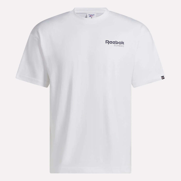 The Reebok Men’s Relaxed Logo T-Shirt is a plain white tee, showcasing a subtle Reebok Classic logo on the left chest and a small black tag on the left sleeve. Made from soft cotton, this relaxed-fit t-shirt features a crew neckline and short sleeves for everyday comfort.