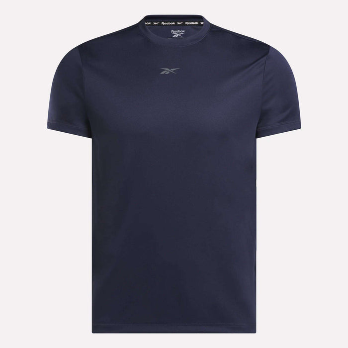 The Reebok Men's ID Train Short Sleeve Tech Tee is a navy gym shirt with a small chest logo, crew neck, and RBK-DRY fabric for comfort and performance in a simple solid-color design.