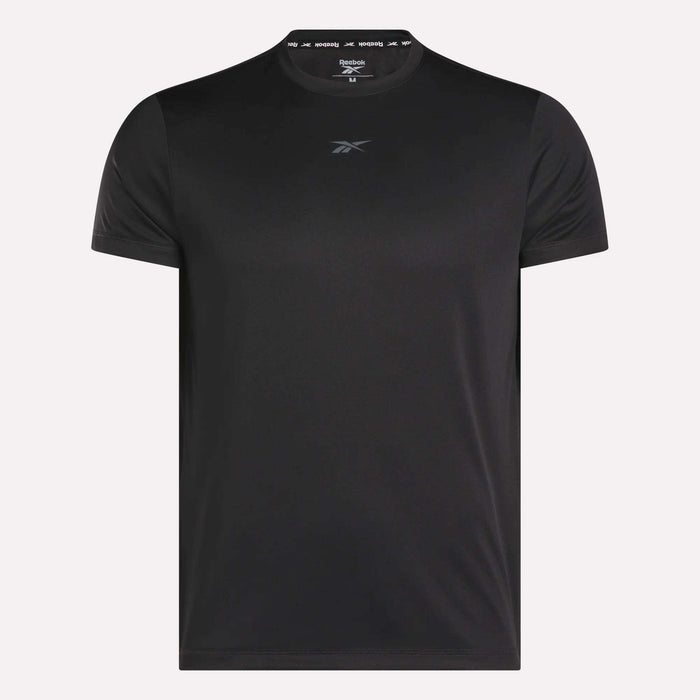 The Men's ID Train Short Sleeve Tech Tee by Reebok is a plain black tech tee with RBK-DRY fabric and a small front center chest logo, shown against a white background.