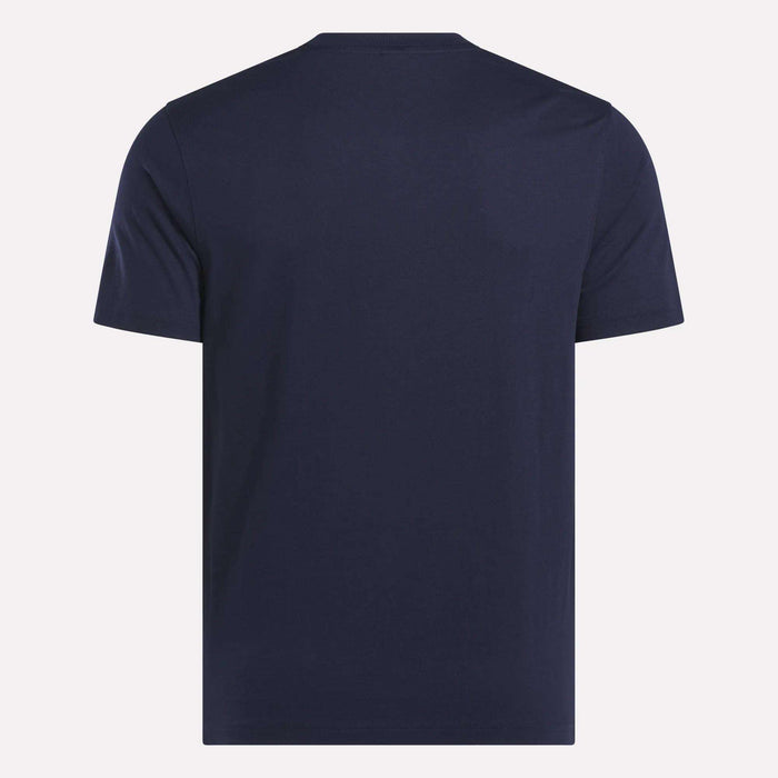 The Reebok Men's Small Logo Crewneck Short Sleeve T-Shirt, in plain navy blue cotton and classic fit, is shown from the back against a light background.