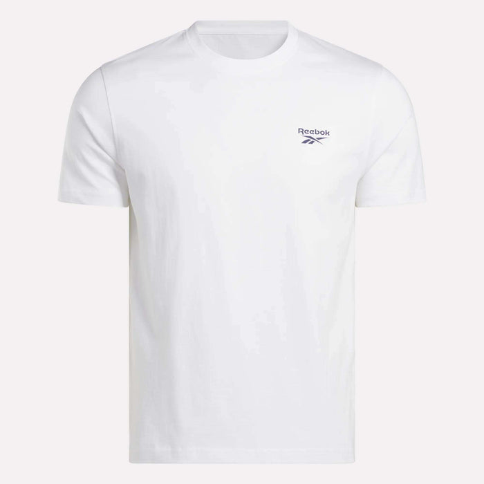 The Men's Small Logo Crewneck Short Sleeve T-Shirt by Reebok is a plain white cotton jersey tee with a small navy Reebok logo and text on the left chest, featuring a crew neckline for classic style.