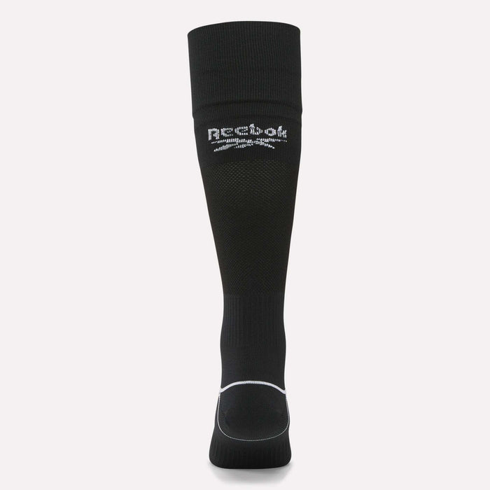A single black Reebok Men’s Soccer Crew Sock with a white logo and text near the top is shown upright on a plain light background. These moisture-wicking socks offer comfort and performance.
