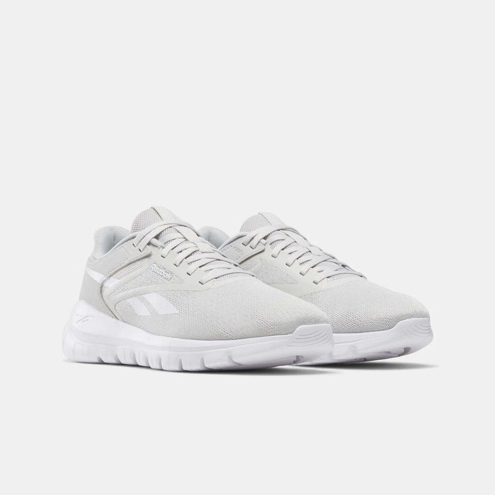 A pair of Reebok Men's Split Flex Training Shoes in light gray with white soles and subtle side branding, perfect for running, HIIT classes, or casual wear, shown on a plain white background.