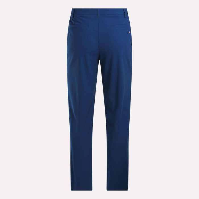 Back view of Reebok Men's The Favorite Golf Pants - Relaxed Fit in blue, featuring two rear pockets and four-way stretch fabric for comfort, shown against a plain light background.