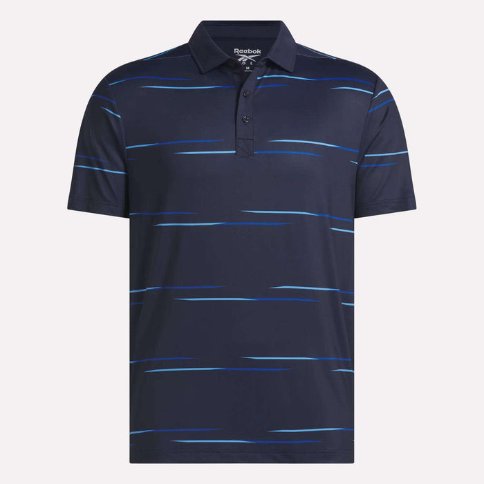 Introducing the Reebok Men’s Tournament Polo Shirt: a navy blue, short-sleeve polo featuring a collared neckline and button placket. This stylish golf polo is adorned with thin, horizontal light blue streaks across the front for a tournament-inspired look. The Reebok logo on the inside collar adds to its comfort and appeal.
