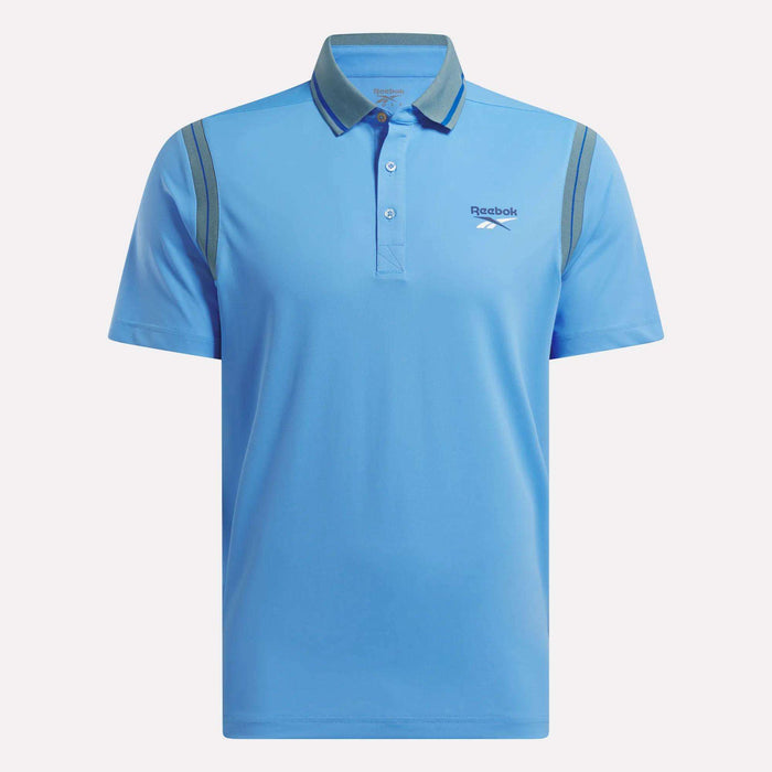 The Reebok Men's Varsity Polo Shirt is a light blue short-sleeve golf polo with gray shoulder stripes, button-up collar, and left-chest logo—ideal as a UPF shirt for active days on or off the course.