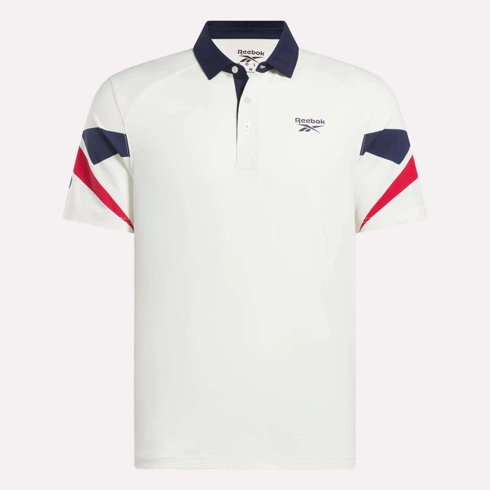 The Reebok Men's Vector Sleeve Polo Shirt features a navy collar, navy and red diagonal sleeve stripes, a small chest logo, and moisture-wicking fabric for all-day cool comfort.