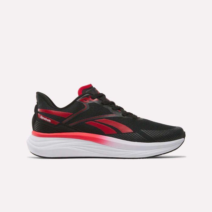 The Men’s Viva Speed Shoes by Reebok, shown in black with red accents and a white sole, feature the Reebok logo on the side and are designed as cushioned running shoes for ultimate comfort and support. They are displayed against a plain white background.