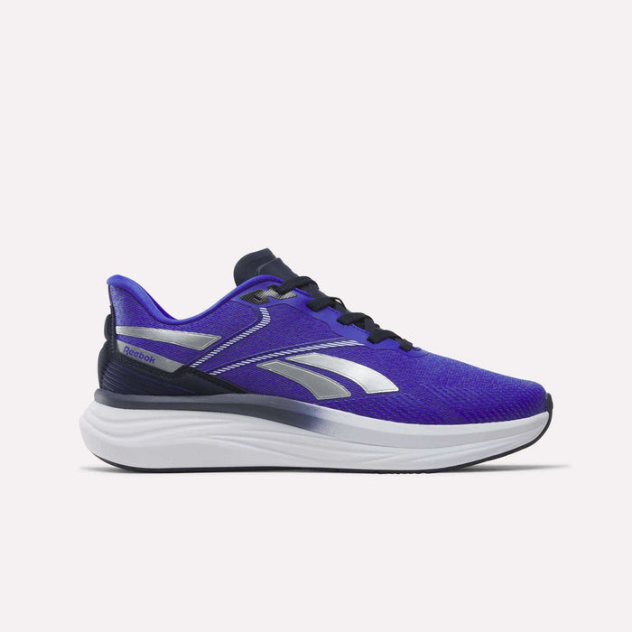 A side view of the Reebok Men's Viva Speed Shoes in Breakout Blue, Vector Navy, and White, featuring a white sole, black laces, and a black outsole on a plain white background. Designed for comfort, these cushioned shoes provide supportive strides.