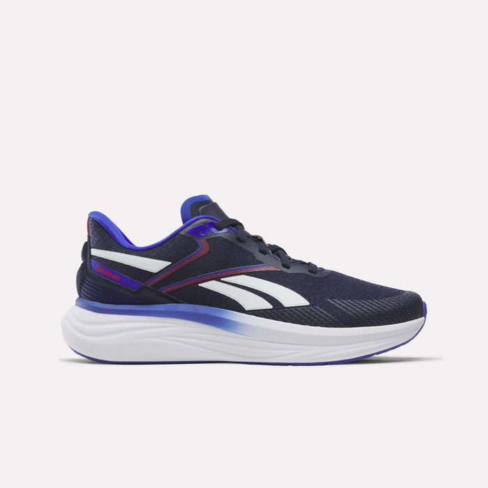 Introducing the Men's Viva Speed Shoes by Reebok in Vector Navy, Breakout Blue, and Rival Red—these athletic sneakers feature a dark blue design with vibrant blue and red accents, a thick white sole, and are built for performance with breathable materials and cushioned comfort. Shown here against a clean, light backdrop.