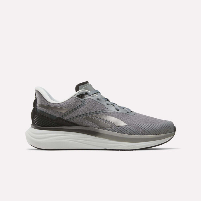 The Reebok Men's Viva Speed Shoes in Grey 4/Grey 5/Black feature a sleek athletic design with black and white accents, a cushioned white sole for enhanced comfort, and a convenient lace-up closure. These breathable men's running shoes are presented against a plain white background.