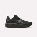 The Reebok Men's Viva Speed Shoes, shown in black with dark gray accents and a thick cushioned midsole for comfort, are displayed in side profile against a plain light background.