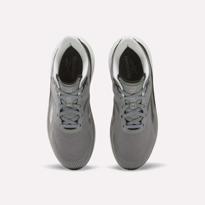 Top view of a pair of Reebok Men's Viva Speed Shoes in gray with white soles and light gray laces on a white background, featuring a breathable design and cushioned comfort for all-day wear.