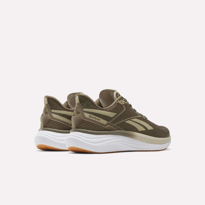 A pair of Men's Viva Speed Shoes by Reebok in olive green, featuring white soles and gum-colored outsoles, are positioned at an angle on a plain white background. These cushioned sneakers are crafted to provide both comfort and style.