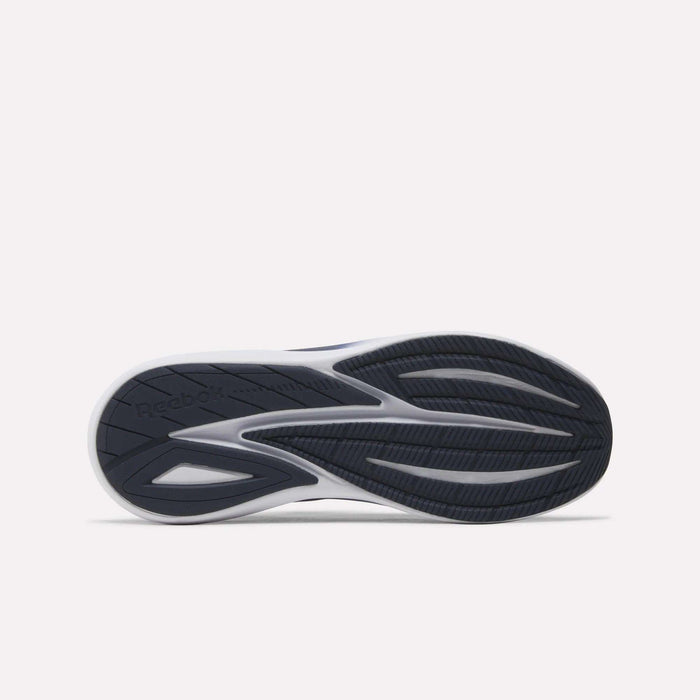 The image displays the underside of the Men's Viva Speed Shoes by Reebok, featuring a dark rubber outsole with geometric tread patterns and the Reebok logo on the left side. Engineered for comfort, these men's Viva Speed Shoes also include a cushioned midsole to enhance support with every step.