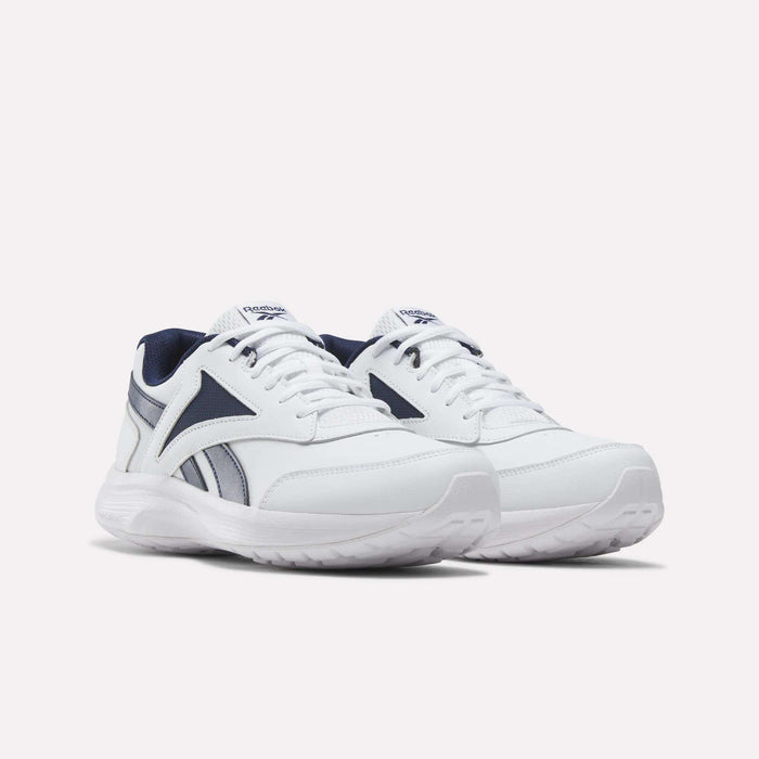 A pair of Men's Walk Ultra 7 DMX Max Shoes by Reebok in white with navy blue accents and white soles, featuring DMX cushioning for enhanced comfort, displayed on a plain light background. Perfect as cushioned walking shoes, these sneakers provide both style and support for everyday wear.