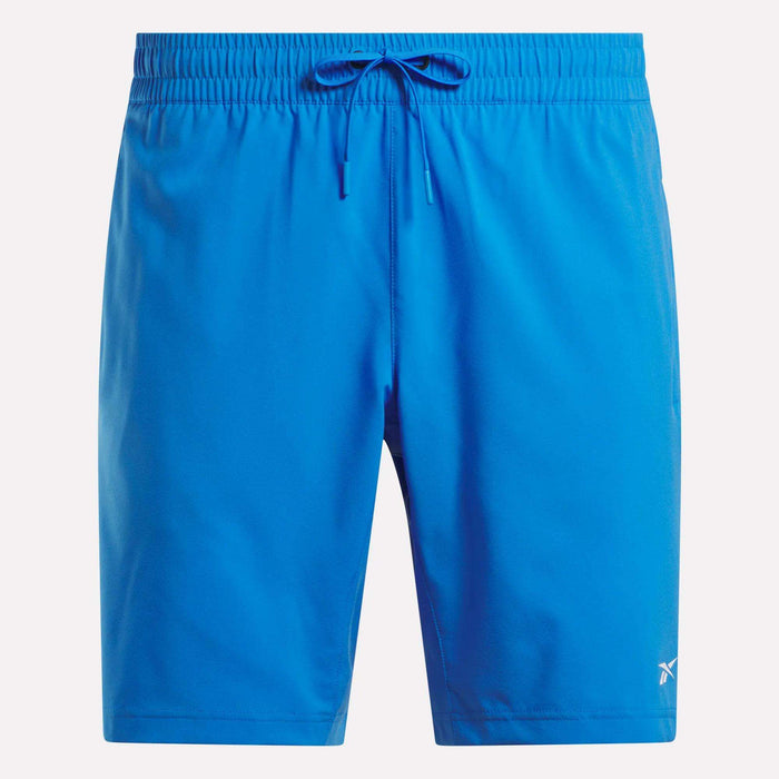 Men’s Woven Shorts by Reebok in bright blue with an elastic waistband, drawstring, and a white logo on the lower left leg. These sweat-wicking workout shorts are shown against a plain white background.