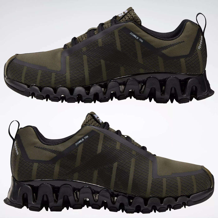 Reebok Men's ZigWild Trail 6 Shoes in olive green and black, featuring zigzag-patterned soles, mesh uppers, and enhanced cushioning, are displayed side by side on a plain white background.