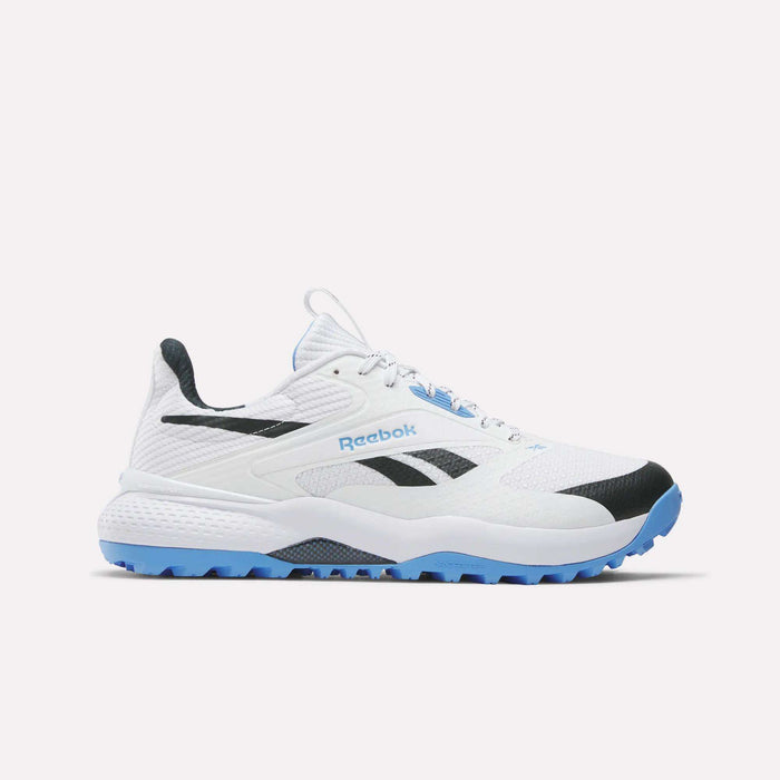 The Reebok Nano Golf Shoes are white athletic sneakers with black and light blue accents, featuring a FlexWeave upper, mesh details, and a textured blue rubber sole, shown in side profile against a plain white background.