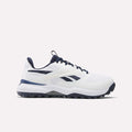 The Reebok Nano Golf Shoes are white athletic sneakers with navy accents, navy laces, the Reebok logo on the side, a grip-textured sole, and a lightweight FlexWeave upper for breathability. Shown in side profile on a plain background.