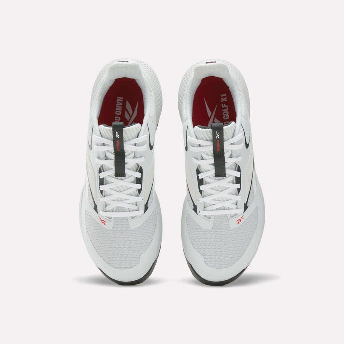 A pair of Reebok Nano Golf Shoes, viewed from above, with white mesh uppers, black and red accents, Floatride foam cushioning, lightweight FlexWeave design, white laces, and red insoles featuring white branding.