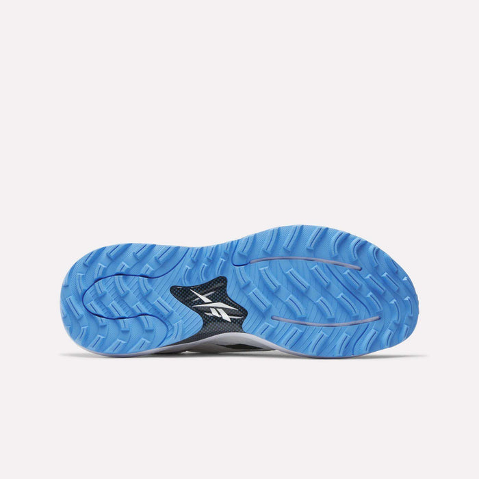 A close-up of the Reebok Nano Golf Shoes, showcasing a FlexWeave upper for enhanced durability and breathability.
