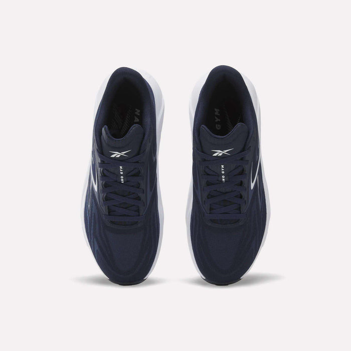 A top view shows a pair of Nano Gym 2.0 Training Shoes by Reebok in navy blue with white soles and Reebok logos on the tongues and sides, placed side by side on a plain white background.