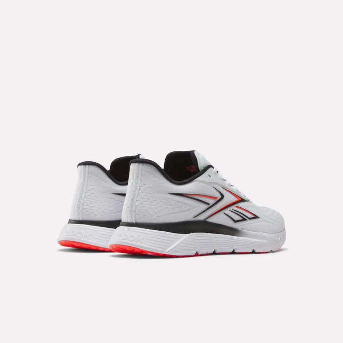 The Reebok Nano Gym 2.0 Training Shoes feature a white design with black and red accents, high-rebound foam soles with a red touch, and side Reebok logos. Shown from the back and side on a plain white background.