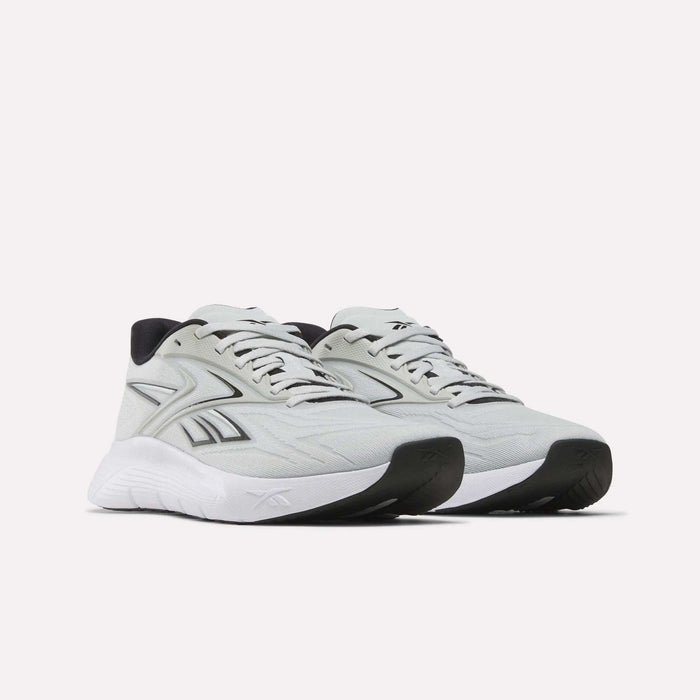 The Reebok Nano Gym 2.0 Training Shoes feature a light gray design with white soles, black accents, and side logos. Shown on a plain white background, they’re perfect for gym workouts or everyday use.