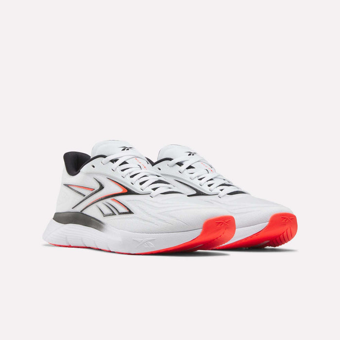 A pair of white Reebok Nano Gym 2.0 Training Shoes with black and red accents, high-rebound foam soles, and Reebok logos on the sides, shown facing slightly right on a plain white background.