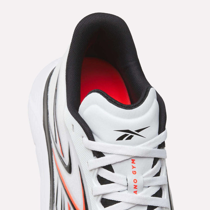 Close-up of Reebok Nano Gym 2.0 Training Shoes, white with black, orange, and gray accents, Nano Gym 2.0 logo on tongue and side, and white laces—designed for training with high-rebound foam comfort.