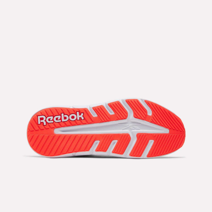 The bottom view of a Nano Gym 2.0 Training Shoe sole showcases a vibrant red and white pattern with the Reebok logo on the heel, offering high-rebound foam for extra comfort—ideal for training.
