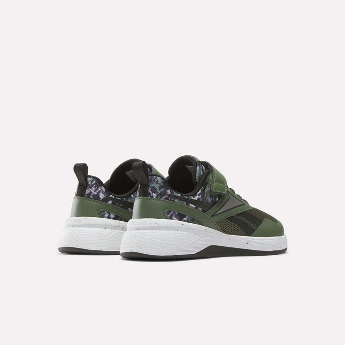 The Reebok Nano Play Stretch Lace And Top Strap Shoes for little kids are shown from the back in green with black and dark camo details, white soles, and black pull tabs—perfect as boys' training shoes in a kid-sized Nano style.