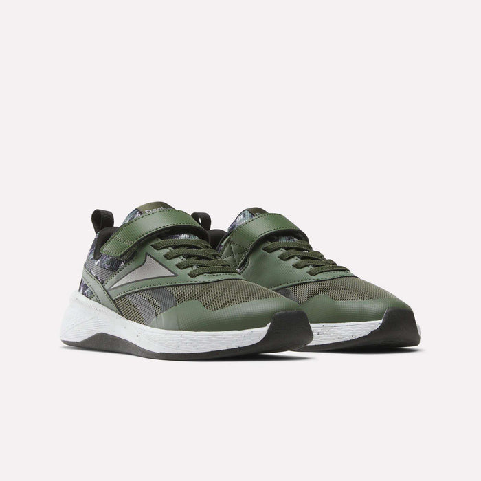 The Reebok Nano Play Stretch Lace And Top Strap Shoes for little kids are green training shoes with black and white accents, mesh panels, a patterned heel, white midsoles, black outsoles, and Velcro straps—ideal for active boys.