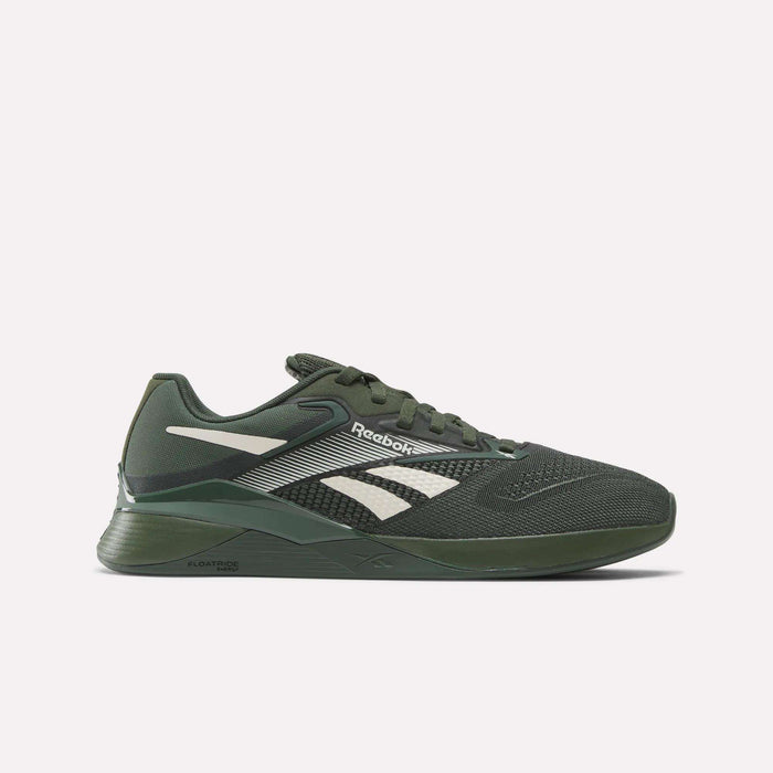 The Reebok Nano X4 Training Shoes, shown in side profile on a light background, feature a dark green mesh upper, white logo and accents, lace-up closure, and a textured rubber sole with Floatride Energy Foam.