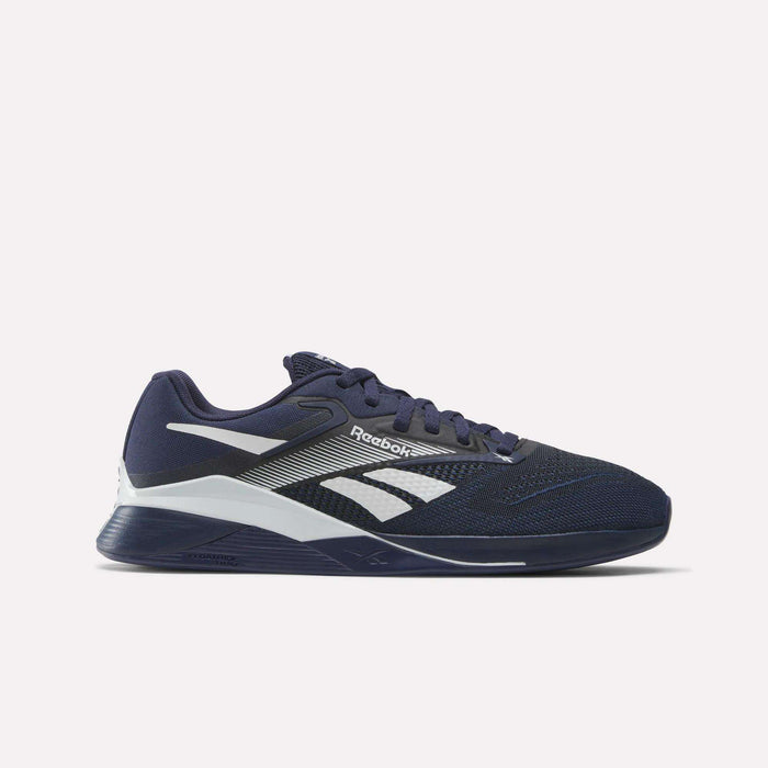 The Reebok Nano X4 Training Shoes in navy blue feature white accents, a white side logo, a breathable Flexweave mesh upper, and a cushioned sole, shown against a plain white background.