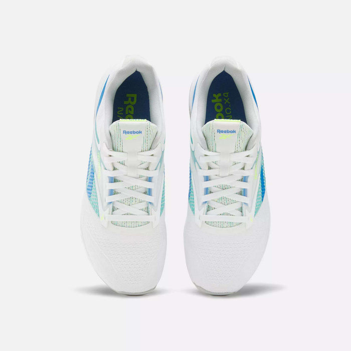 A pair of Reebok Nano X4 Training Shoes in white with blue and green accents, shown from above on a plain light background. The breathable shoes are laced up and placed side by side.