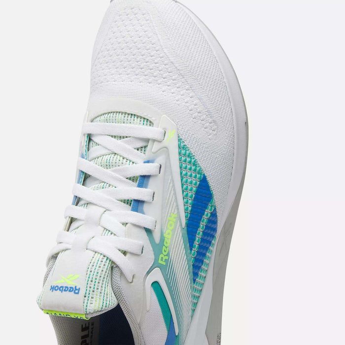 The Reebok Nano X4 Training Shoes are lightweight and breathable, featuring a white design accented with blue and green stripes.