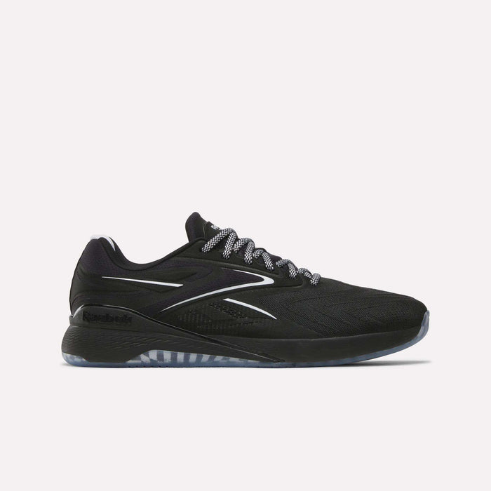 The Reebok Nano X5 Edge Training Shoes are displayed in a side profile against a plain white background, featuring a black upper with white accents, a patterned sole, and black-and-white laces that emphasize their performance-driven design.
